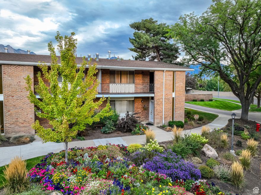 Estate Sale! This 2,880 sq ft townhome is brimming with potential- perfect opportunity for a savvy investor or anyone wanting to put the work in to unlock instant equity. Owned by the same family for the past 56 years (believed to be the 8th owners in the entire development), this property is a true piece of Three Fountains history. Tucked away in a prime, central location within the community, this end-unit townhome offers a beautiful flower bed and grassy area just outside the front door. Original details include a full vintage mirror in the front room, wood burning fireplace, and a laundry chute. The main floor layout is perfect for entertaining, plus the bonus of a convenient main floor bedroom. Upstairs you will find a spacious primary suite with its own private balcony, while 2 additional bedrooms offer mountain views. The downstairs has a large family room, a second kitchen area, and room to grow in an unfinished space. The HOA takes care of all yardwork (lush, perfectly manicured grounds & gardens), water, sewer, snow removal, trash service, and even provides on-site maintenance. Community perks include a clubhouse with a full kitchen, exercise room, outdoor pool, community garden, sports court, & playground area. Outside is your own back patio and a 2-car covered carport with storage. You're just a stroll away from Murray Park & Mick Riley Golf Course. Sold As-Is, priced accordingly.