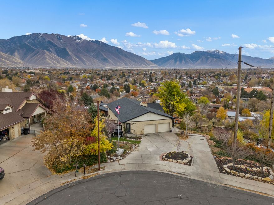 Enjoy wide-open mountain and valley views, including some of the best fireworks views in the entire valley. The home works perfectly for large families or multi-family living, with three full levels and a basement apartment that has its own entrance, full kitchen, bathroom, and bedrooms. It's also an awesome spot to watch local wildlife, including quail and other frequent visitors to the property. Recent updates include a new roof installed two years ago and a new heating and air system installed three years ago. Each of the three floors has its own HVAC zone and thermostat for better comfort and efficiency. Sitting on nearly half an acre in a quiet Springville neighborhood, the property offers plenty of space and great natural views.
