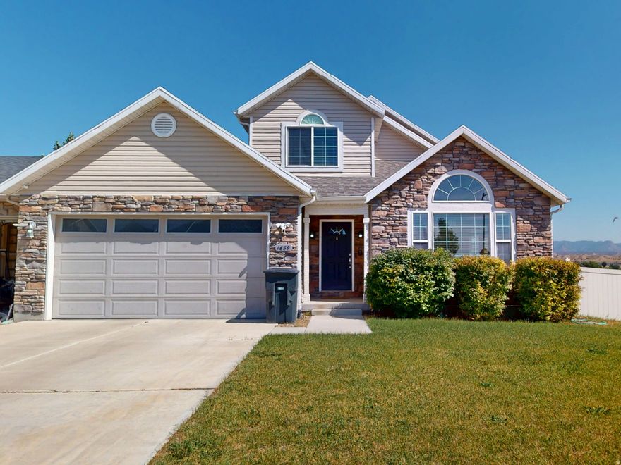 Discover this delightful twin home, perfectly designed for comfortable living. Built in 2010, this residence offers three spacious bedrooms and two and a half bathrooms, providing ample space. The home features an open-plan living, dining, and kitchen area, ideal for modern living and social gatherings. The high ceilings enhance the sense of space and light, creating a warm and welcoming ambiance. The property is cleverly designed to ensure privacy, sharing only a garage wall with the neighboring home. Additionally, a patio off the open dining room offers a perfect spot for outdoor dining or relaxation. Step outside to enjoy the fully fenced and landscaped backyard, complete with an automatic sprinkler system for easy maintenance. This outdoor oasis is perfect for relaxing, pets, or hosting summer barbecues. Additionally, the home includes a partially unfinished basement, offering potential for customization. Imagine adding two extra bedrooms to accommodate guests, or transforming the space into a home gym, workshop, or additional storage area. This twin home is a perfect blend of style, convenience, and potential, ready to welcome its next owner.