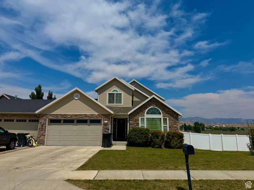 Discover this delightful twin home, perfectly designed for comfortable living. Built in 2010, this residence offers three spacious bedrooms and two and a half bathrooms, providing ample space. The home features an open-plan living, dining, and kitchen area, ideal for modern living and social gatherings. The high ceilings enhance the sense of space and light, creating a warm and welcoming ambiance. The property is cleverly designed to ensure privacy, sharing only a garage wall with the neighboring home. Additionally, a patio off the open dining room offers a perfect spot for outdoor dining or relaxation. Step outside to enjoy the fully fenced and landscaped backyard, complete with an automatic sprinkler system for easy maintenance. This outdoor oasis is perfect for relaxing, pets, or hosting summer barbecues. Additionally, the home includes a partially unfinished basement, offering potential for customization. Imagine adding two extra bedrooms to accommodate guests, or transforming the space into a home gym, workshop, or additional storage area. This twin home is a perfect blend of style, convenience, and potential, ready to welcome its next owner.