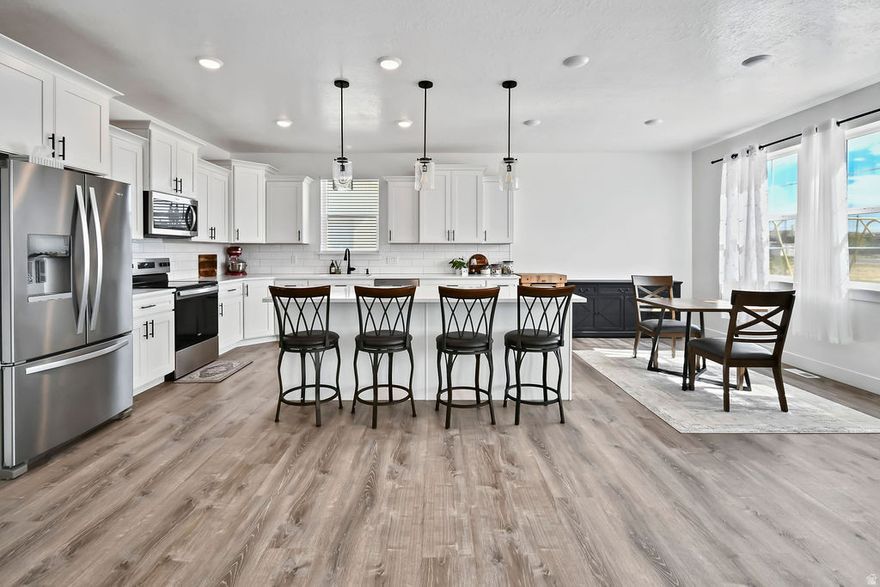 Beautiful modern Craftsman in a newer Gunnison subdivision with gorgeous views and 4,740 sq ft total... 2,370 on the main and 2,370 in the basement. The main level features 3 bedrooms, 2 bathrooms, and a spacious kitchen with quartz counters and white cabinets, plus a roomy laundry room with built-in cabinets, shelves, and a rod. The primary bedroom has a large walk-in closet, and the primary bathroom includes a walk-in shower and a tub/shower combo. The unfinished basement offers great potential with 9 ft ceilings, a plumbed bathroom, several daylight windows, and an exterior entrance... finish it your way or set it up as a separate living space. The extra deep 3-car garage has epoxy floors with plenty of room for vehicles and storage. Tankless water heater, water softener, and kitchen appliances included. Located near the park and community pool, with 12 Mile just 10 minutes away for four-wheeling and camping. Move-in ready.  Square footage figures are provided as a courtesy estimate only and were obtained from county.  Buyer is advised to obtain an independent measurement.
