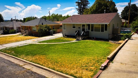 Photo of 713 S ROBINS AVE E, Ogden, UT 84404 (MLS # 2180859)