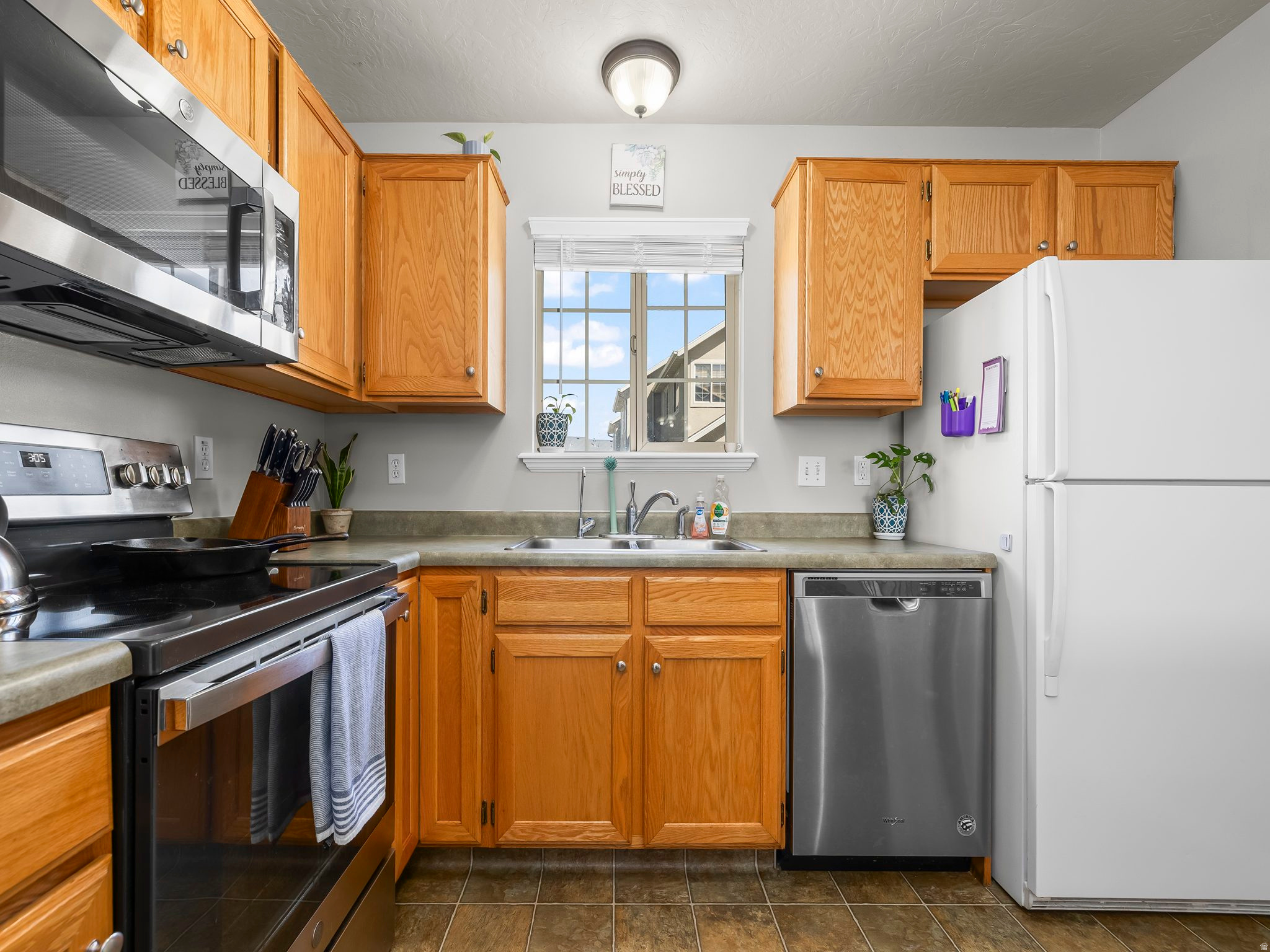 TOWNHOMES AT CAMELOT - Residential