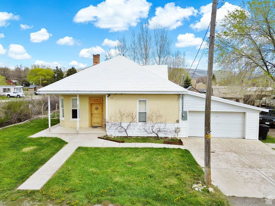 OPEN HOUSE - Saturday, July 19th from 11:30am - 1:30pm. Charming home on large lot. Many upgrades. Main floor has two bedrooms and two bathrooms. One woodburning stove in the living room.  Good size kitchen and laundry room.  There are two rooms upstairs.  Basement has a concrete floor and is used as utility/mechanical and storage. The thick brick/adobe walls help cool in summer months. This comfortable home sits on .53 acres which extends to the south.  Horse property.  It is a good set-up with two stalls and a garden area.  The portable horse panels are exempt and will not stay. Nice corner lot, quiet neighborhood, and within walking distance to Fountain Green Elementary and the city park.  Square footage figures are provided as a courtesy estimate only and were obtained from Sanpete County.  Buyer is advised to obtain an independent measurement.