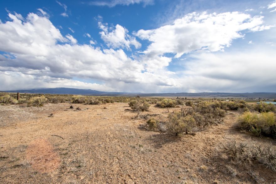 Phenomenal property in a scenic area with mountain and valley views. Water is stubbed to lot line and power is available in the street. A foundation for a shed or outbuilding is poured and ready for completion. The lot elevation allows for a homesite that overlooks outbuildings. Ready-to-build lot in a great location!