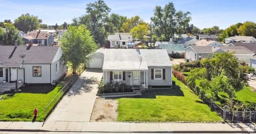 Don't miss out on this charming 2-bedroom home on a massive lot with solar.  Discover this beautiful 2-bedroom, 1-bathroom home featuring a spacious living room with new carpet and massive bedrooms for ultimate comfort.  The large kitchen offers plenty of storage, perfect for cooking and entertaining.  Enjoy the outdoors on the massive lot, complete with a garage and ample parking space.  Plus, benefit from solar power for energy savings and a prime location close to Hill Air Force Base, shopping, and dining. Move in ready, beautifully cared for, and perfectly located must see!