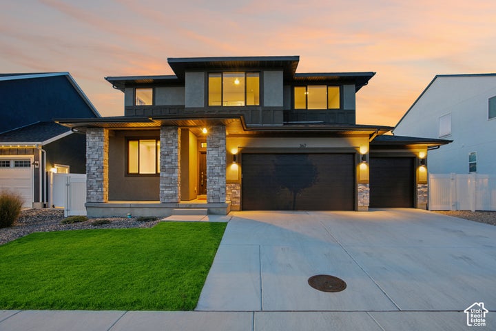 Modern exterior with a stone and stucco finish