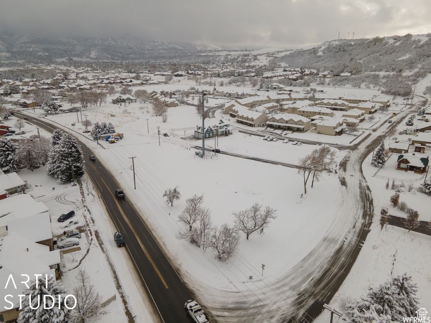 Flat, improved residential building lot in the desirable community of South Weber. Beautiful setting looking towards Utah's Rocky Mountains with close access to the canyons for world-class skiing, snowboarding, sledding and hiking, biking, and camping when the Utah snow melts. Good schools. Close proximity to 89 and I-15, HAFB, and the downtown local cities for shopping and entertainment. Bring your own builder or consider using ours. Owner/agent