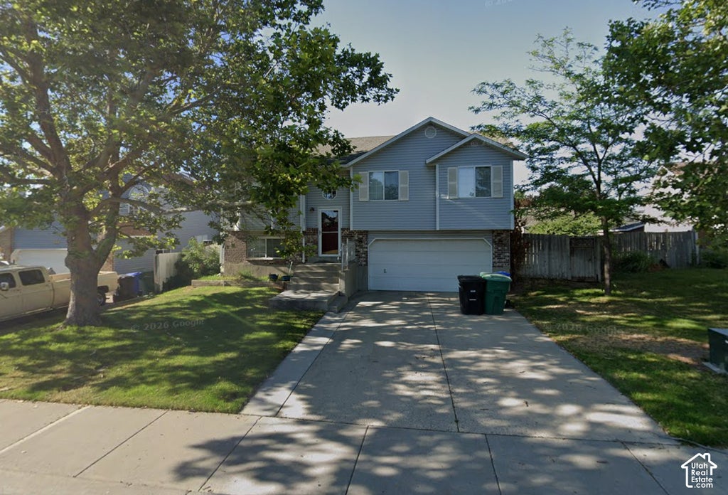 Photo of 5371 W TICKLEGRASS RD, West Jordan, UT 84081 (MLS # 2191354)
