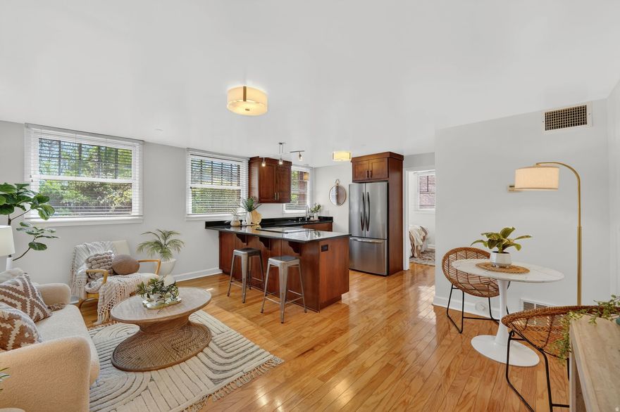 Beautifully maintained condo located in the heart of the highly sought-after Avenues Historic District, blending timeless character with modern convenience. Set within a secure building dating back to 1938 and recognized on the National Register of Historic Places, this residence offers a unique opportunity to own a piece of Salt Lake City history while enjoying today's comforts. The unit is in excellent condition and features gorgeous hardwood floors, a spacious walk-in closet, and an updated kitchen complete with disposal and dishwasher. Additional highlights include in-unit washer and dryer, a private parking stall, and a dedicated storage locker conveniently located on the same level. Perfectly positioned in a prime Avenues location, this home offers easy access to downtown, dining, The U of U and nearby amenities while maintaining the charm and architectural integrity that make the Avenues so desirable.