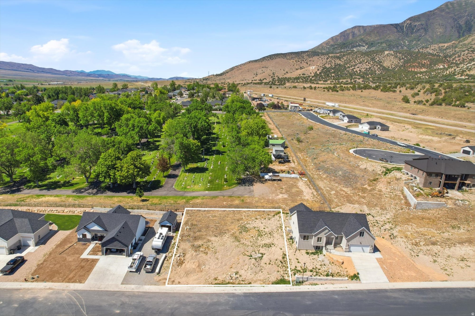 Cleared residential lot with defined boundaries