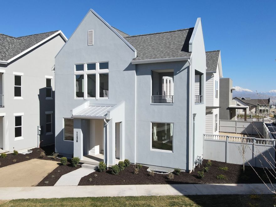 Just completed! Brand-new construction home featuring a finished basement and a 6-foot fenced backyard, nestled in a quiet, tucked-in location with open green space in front of the lot. The price includes impressive designer upgrades such as a wet bar, 9-foot ceilings on all levels, a fireplace, upgraded railing, and an incredible indoor/outdoor living layout with large sliding glass doors connecting the Great Room and Kitchen. The main-level office is filled with natural light from abundant windows. The dreamy Primary Suite offers a covered balcony that is hot tubready, along with a spa-inspired en-suite bathroom featuring a stand-alone soaking tub and a large walk-in shower.  Photos are of the actual home.