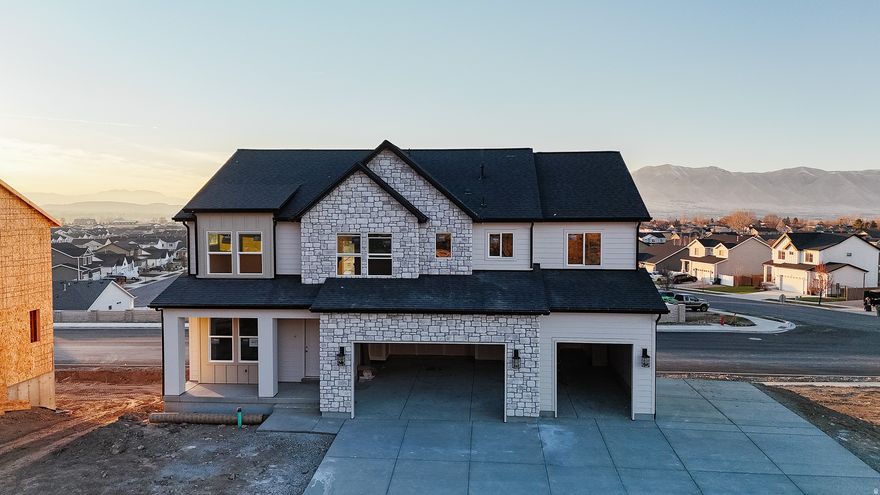 **OPEN HOUSE JAN 10 FROM 11AM-1PM** $20,000 preferred lender incentive!! Welcome to the Tracie in our BRAND NEW Payson View South Subdivision. Perched perfectly to capture the best of both worlds. Mountain views from the front and panoramic Payson Valley views from the back. This 4,293 square foot new build brings light, luxury, and livability together in one stunning package. Expansive windows flood the home with natural light and frame the scenery like artwork in every room. With 4 bedrooms, 3 bathrooms, and a smart, open-concept layout, this home is designed for comfort and connection. Thoughtful details and high end finishes elevate every space, while the walkout basement adds flexibility for future growth or entertainment. Now under construction and estimated to be completed January 2026 come see where modern design meets the beauty of Utah living.