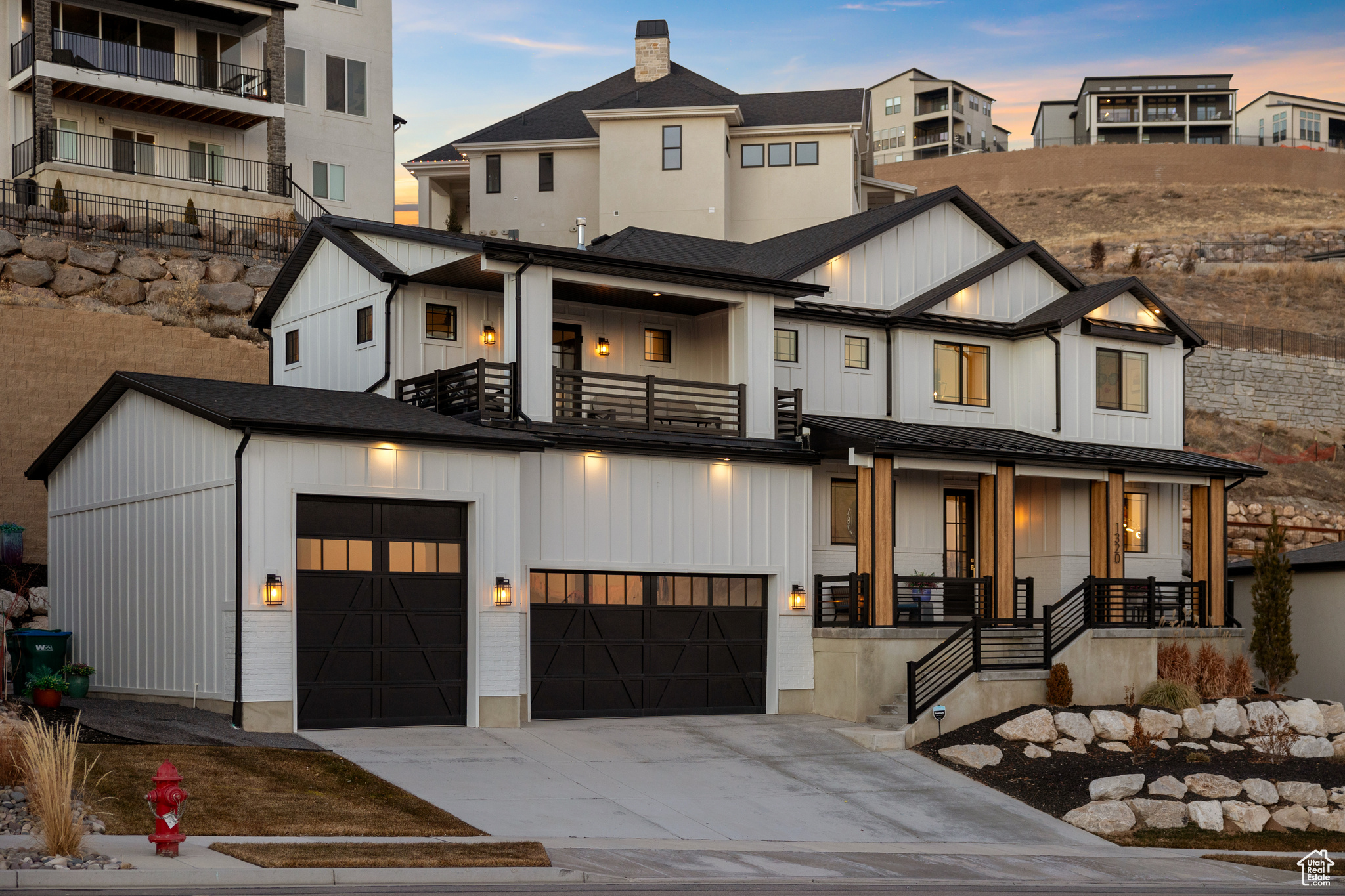 The Lake View Estates Community in Traverse Mountain with stunning south valley views of Mt. Timpanogos, to the sunsets of Utah Lake. The home was carefully designed modern farmhouse with open sight lines to create those forever memories and timeless moments. This custom home interior finish features include: Large 8' modern 5 panel glass front door, double glass doors in the front office, luxury vinyl plank flooring, decorative tile in all the right places: mudroom, laundry, and bathrooms. 18' ceiling height in entry way & Great Room area featuring a precast mantel fireplace with floor to ceiling shiplap accent wall. Stunning lighting fixtures. Quartz countertops throughout the entire home including laundry room. Custom built 2-tone (black & white) cabinets featuring soft close doors, Pull hardware, including double pull out trash bin inside the island with exposed shelving on the dining area, Kitchenaid stainless steel appliances with built in microwave/oven and custom cabinet range hood. Convenient grocery access door from the garage into pantry. The 2nd level features: Laundry room cabinets with sink. Primary bedroom features wainscoting accent wall. Inside the grand primary bathroom features a modern standing shower enclosed by a euro glass door followed by a free standing black & white tub, also custom closet cabinetry's/railing. Take in the early morning rise and Utah's beautiful lake views inside the bedroom with a 20' x 10' private balcony surrounded by custom black metal railing. With 3 more additional bedrooms and 1 bathroom on the second level. A loft area that overlooks into the great room and entry way featuring black metal railing. Custom 2-tone door handles all throughout. This home offers a custom mud room wood bench with lockers. The basement has a great entertaining room equipment with built in 5.1 surround sound system, and glass door leading into a fitness room. There is also an additional unfinished room that could be a bedroom.  Epoxy garage flooring for easy up keep in the garage.  The exterior of the home features: covered front porch area. With a rear patio area leading down trex decking stairs and rock retaining walls with rock slab stairs, along with a custom built BBQ area / hot tub and automated exterior lighting. The property also features a security system that can be assumed. The entire property has easy low maintenance landscaping.  Schedule your showing to view this stunning property with undisputed views. Square Footage figures are provided as a courtesy estimate only. Buyer is advised to obtain an independent measurements.