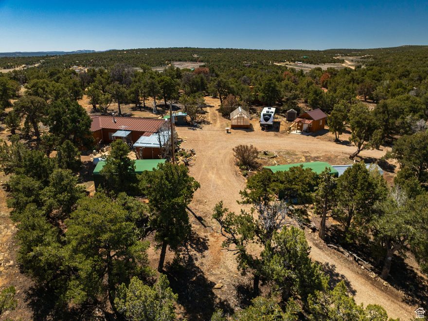 * Cozy secluded cabin on 10 Acres!! * Beautiful property feels like you're in the woods with TONS of tall trees & pretty landscape - great location!! * Home features a private WATER WELL, POWER & Septic System installed - all ready for year-round living or your perfect vacation getaway! * Cabin is a 3 bedroom 2 bath with loft space above for storage (large newer addition off the back with 2 bedrooms & mini-split heat/ac units in each room) * 2 cozy family rooms with a fancy propane stove to stay warm in winter * Covered porch and open patio * Firepit & nice stone patio out back with small fenced yard * BONUS: Super cool guest cabin with stunning tongue & groove interior plus it's connected to power! * This property includes so many extras that you'll enjoy for outdoor living like a large Greenhouse with water & electric, Newer metal garage, 2 carports and Shed for storage/toys * Great flat usable ground for family/friends to bring their campers & enjoy the outdoors with you! * Good access & nice roads just a few mins off Hwy 40 near Fruitland * Could be a great Horse property * If you love the outdoors like hunting, fishing, boating, kayaking, hiking etc this is the perfect property! * Get away from the city & enjoy peace & quiet! Located only minutes from Starvation Reservoir & Strawberry Reservoir - miles & miles of dirt roads to ride 4wheelers, side by sides or horses! * Seller is also selling the side by side, please ask for details. * Easy to show! *