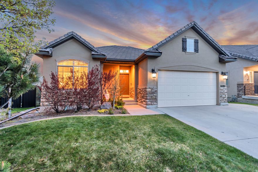**OPEN HOUSE - Sat April 18th - 11am-1pm** This beautiful ranch-style home sits on the edge of a quiet neighborhood adjacent to protected open space, ensuring privacy and stunning views for years to come. Vaulted ceilings, an open floor plan, and large deck with breathtaking views make it perfect for quiet evenings or entertaining. The finished walk-out basement with wet bar could easily be converted into a mother-in-law apartment. Enjoy a movie in the home theater with included seating, screen, projector, and sound system. After the movie, slip out to the covered patio and unwind in the hot tub, complete with privacy screens and heaters for those crisp evenings. Additional highlights include plantation shutters, new furnace, and 50-yr fiberglass shingle roof. Outdoor enthusiasts will love the hiking & biking trails just outside the front door. Community amenities include: clubhouse, pool, hot tubs, gym, parks, b-ball & pickleball courts. Located near shopping with easy access to I-15. HOA fee includes high-speed internet and cable TV.