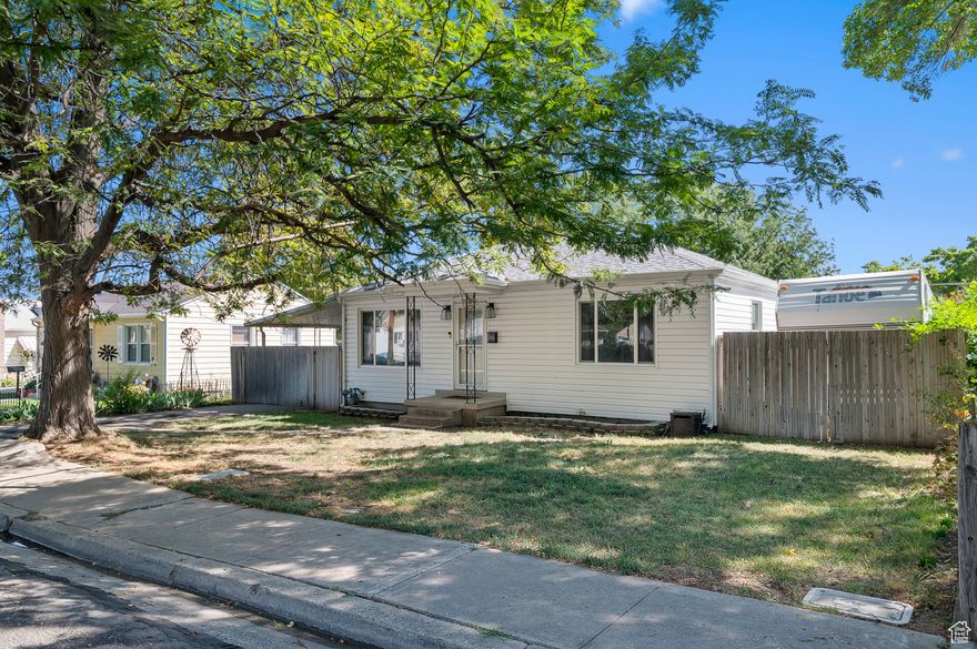 **Motivated Seller** Welcome to this bright and clean rambler in the heart of Magna! This home has been a project for the previous owner, so you'll appreciate the convenient updates and fresh touches throughout - including new paint, flooring, appliances, and new roofs installed only 3 years ago. With a functional layout and natural light flowing in, it's move-in ready while still offering room to make it your own.  Sitting on a quarter-acre lot, this property provides a great yard with plenty of space to enjoy, garden, or entertain. The unfinished basement gives you endless potential to expand your living space, create a rental, or design the perfect rec room. Outside, you'll find a detached garage plus a covered parking spot, making it ideal for a shop, extra storage, or hobbies.