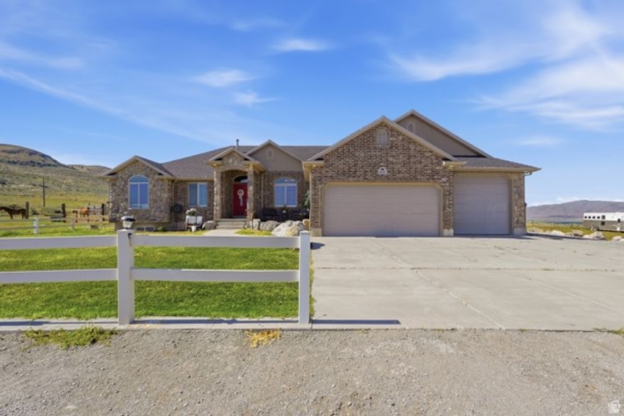 Views, Privacy & Endless Possibilities! This property is truly one of a kind! Situated on 13+ fully fenced acres, it offers complete privacy and breathtaking valley views that are hard to find. The home features a spacious open floor plan with vaulted ceilings, a large family room, and generously sized bedrooms-perfect for comfortable living and entertaining. Finished basement with 3 additional bedrooms, brand new bathroom, large family room and you can't miss the comfy doghouse with new carpet. Enjoy peace of mind with a new roof 2026. Furnace and AC replaced 2024. Water pump system valued over $6000. You'll find an extra-large garage with RV parking, a fenced backyard with a fire pit, and plenty of room for animals, recreation, or whatever your vision may be. Additional 1.25 acre lot ideal for your next gun or archery range. (05-107-0075)   If you're looking for space, privacy, and incredible views, this property delivers it all!