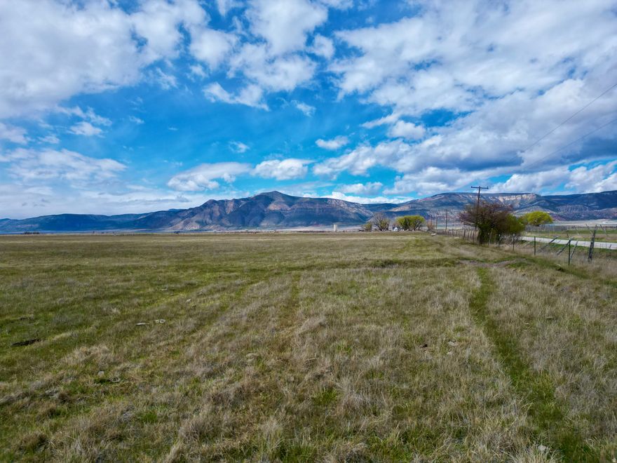 Escape to wide-open space with this 40-acre parcel in Sanpete County, Utah-an ideal blend of buildable land, grazing potential, and year-round recreation. Located near the intersection of 13000 N and 3450 E, this property sits just minutes from Spring City, Mt. Pleasant, and Ephraim, while remaining only about an hour from the Provo and Spanish Fork area for convenient access to city amenities.  This versatile acreage for sale features natural sub-irrigated 5W silt loam soils, known for excellent moisture retention-making it well-suited for livestock grazing, A valuable water right is included, allowing for stockwatering, domestic, or irrigation purposes, supported by the Colorado Plateau Aquifer.  Positioned in a scenic valley between the Uinta National Forest and Manti-La Sal National Forest, this property offers exceptional access to public land and outdoor recreation. Whether you're seeking hunting land, a recreational getaway, or a rural property to build your dream home, this location delivers. The surrounding GMUs 12/16b/16c  and 16a provide prime opportunities for hunting.  Enjoy sweeping views of Big Mountain and Haystack Mountain right from your future homesite. With peaceful surroundings, strong agricultural potential, and proximity to some of Central Utah's best outdoor destinations, this land for sale presents a rare opportunity to invest in a true mountain-valley lifestyle.  GPS Coordinates 39.4576, -111.57515  Property Highlights 40 acres of buildable land in Sanpete County, Utah Water right included (stockwatering, domestic, irrigation) Located over the Colorado Plateau Aquifer Sub-irrigated 5W silt loam soil - ideal for grazing  Suitable for horses, cattle, or rural homestead Minutes to Spring City, Mt. Pleasant, and Ephraim Approx. 1 hour to Provo / Spanish Fork Surrounded by Uinta & Manti-La Sal National Forest access Located near GMUs 12/16b/16c (central mtns, manti/san rafael) and 16a (central mtns, nebo) Sweeping views of Big Mountain & Haystack Mountain Strong recreational, ranch, or investment land potential