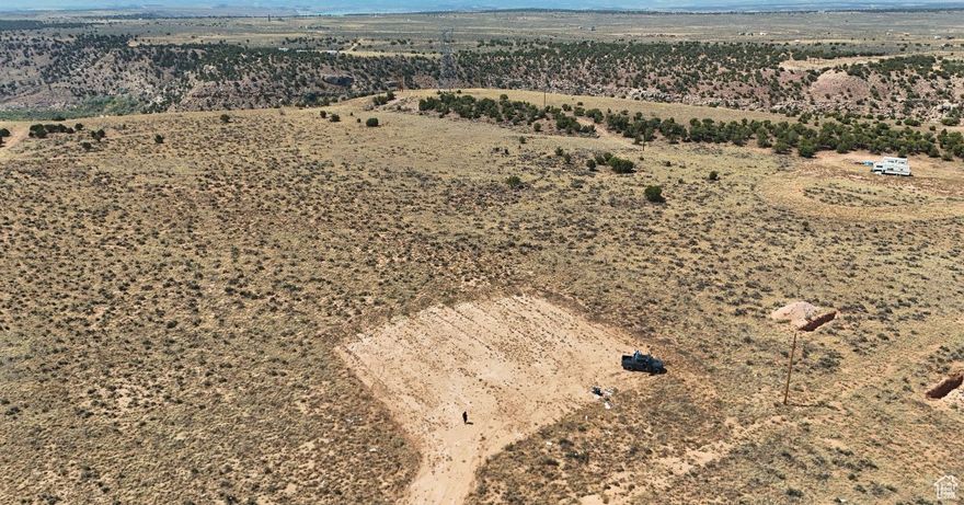 Flat and buildable 5-acre parcel in Conejo Hills. Enjoy year-round access, privacy, and scenic desert views. Great for a homesite or getaway. Power nearby, water rights included for drilling a well, and septic available at buyer's expense.