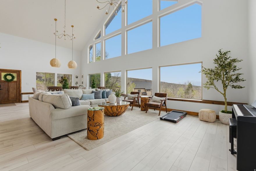 Tucked behind the gates of Timber Lakes, this 2.1-acre mountain property offers a rare opportunity to own a slice of quiet alpine living without sacrificing accessibility. Towering trees provide natural privacy, while year-round access ensures you can enjoy every season with ease. Wake up to sweeping views of the Wasatch Back Mountains and spend your days immersed in fresh air, open space, and the calm that only mountain life can offer. The setting is ideal for a primary residence or a  weekend escape in one of Utah's most desirable recreational areas. Conveniently located just outside Heber City and within easy reach of Park City, you're never far from dining, shopping, and some of the region's best skiing, hiking, and outdoor recreation. This is where privacy, scenery, and opportunity come together. Buyer to verify all.