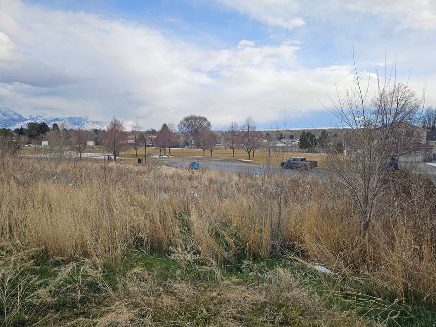 There are very few lots available in this part of American Fork for sale. Look at this lot any time to see if you can build your spec home on this property. The property has a nice slope which provides excellent views of Utah Lake and the surrounding Mountains. This lot is located at the end of the street and is across the street from the city park. Power, sewer, water and pressurized irrigation are all in the street.