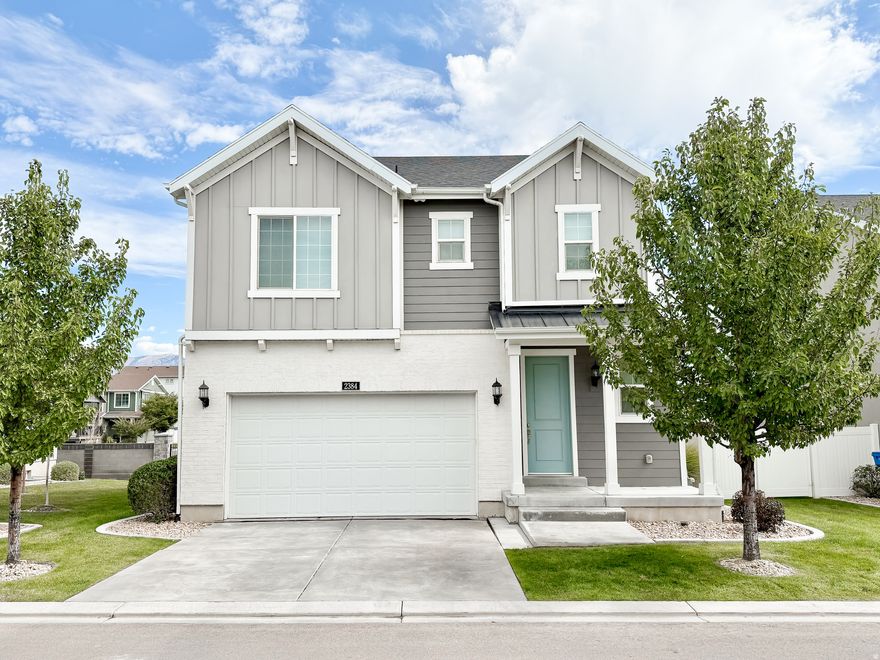 Beautifully Upgraded One-Owner Home Located in The Cottages of Holbrook Farms  Prime Lehi Location  Built in 2018, this single-owner, 4-bedroom, 3.5-bathroom home offers 3,000 square feet of living space and extensive custom upgrades throughout.   Each room features upgrades including new light fixtures, hardware, custom wall treatments, and millwork that add character and design. The interior walls have all been freshly painted for a move-in-ready feel.   The main level features an open-concept design including an open staircase, spacious kitchen, half bathroom, and an inviting living room with an upgraded fireplace.    The second floor features a spacious primary suite with mountain views and a large bathroom with a soaking tub, separate shower, and two walk-in closets. The upper level also includes a multi-functional loft, two bedrooms, a full bathroom and a large laundry room.    The finished basement includes a bonus family room, a full bedroom with a walk-in closet, and a full bath-perfect for large families or accommodating guests.  The garage walls are finished and painted, with an electric vehicle charging port installed.  Throughout the home, custom light-filtering roller blinds allow for maximum natural light while maintaining privacy, and all upstairs bedrooms feature blackout roller blinds for restful nights.   Outside, this home offers a covered back patio and one of the largest yards and widest home spacings in the neighborhood, with an attached green space offering privacy and extended outdoor enjoyment. All year, the HOA fully maintains the yard and provides snow removal. The west-facing orientation of this home provides ideal afternoon/evening shade and quick melting of snow.  This home is conveniently located near I-15 for north and south commutes, shopping, schools, restaurants, churches, hospitals, Silicon Slopes, and is located in one of Lehi's most desirable communities.  Measurements were provided as a courtesy from the Tax Data. Buyer is advised to obtain an independent measurement.