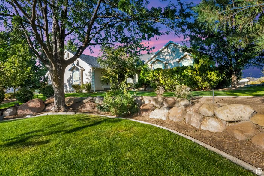 RARE EQUESTRIAN RETREAT, MASSIVE SHOP & STUNNING GROUNDS.. Discover a one-of-a-kind Rambler/Ranch home in coveted Eagle Mountain, set on 1.31 serene acres with room to breathe, play, and entertain. This exceptional estate blends country charm with modern comfort and is designed for horse lovers, hobbyists, and anyone craving extra space. Equestrian features include three 24' x 12' horse stables and an impressive 24' x 50' stall, while the beautifully landscaped grounds showcase mature pine and fruit trees, vibrant shrubs and flowers, and even an underground root cellar. There's ample space to park horse trailers, equipment, and recreational toys. A true highlight is the detached 40' x 60' heated shop with 16' x 14' doors-large enough to accommodate eight cars or two full-size RVs-complete with RV electrical hookups inside and out and driveway parking for up to ten additional vehicles. The attached oversized three-car garage offers extra width and depth for everyday convenience. Inside, the home welcomes you with a vaulted-ceiling foyer, a formal living room that doubles as a home office, and a spacious great room anchored by a cozy gas fireplace. The gourmet kitchen is a chef's delight with granite countertops, custom cabinetry and backsplash, gas cooktop and wall oven, built-in microwave and dishwasher, and an oversized island with abundant storage. A large pantry, mudroom with cabinetry, and convenient half bath complete the main living space. The private owner's suite creates a relaxing retreat with a custom walk-in shower, jetted soaking tub, double-sink vanity, and generous walk-in closet. Two additional bedrooms, a full bath with double sinks, and a main-floor laundry with folding table and built-in ironing board add comfort and practicality. Downstairs, a walk-out lower level expands your living options with a huge family room featuring built-in entertainment center and bookcases, three additional bedrooms, a full bath with double sinks, a built-in study desk with cabinetry, and a large mirrored gym-ideal for workouts or dance practice. Thoughtful upgrades include central air, central vacuum, two new water heaters, and a two-year-old furnace and AC. Efficient propane heat and a private septic system complete the package. Whether you're hosting gatherings on the secluded covered porch, caring for horses, or tackling projects in the massive heated shop, this property delivers an exceptional blend of luxury, space, and functionality.