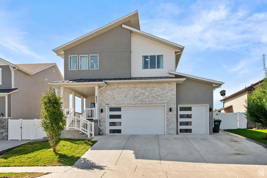 Built in 2020, this stunning contemporary modern home in the Vistas @ Westridge offers modern living at its finest with a dramatic open-to-below design from the upstairs, oversized windows filling the home with natural light, 6 bedrooms and a spacious 3-car garage The open-concept kitchen features upgraded 42" cabinets, an island, granite countertops, and premium appliances, while the grand master bath provides a true retreat. Additional highlights include upstairs laundry, a fully finished basement with separate entrance and complete kitchen ideal for guests, in-laws, or rental income, and a prime location with easy freeway access and nearby amenities-all with NO HOA.