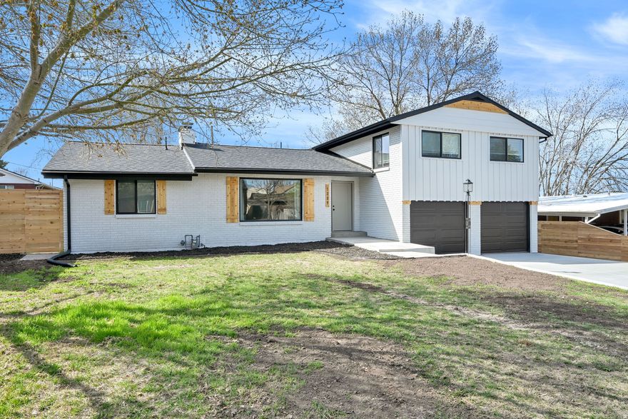 Located on the desirable East Bench, this extensively remodeled home offers both modern upgrades and flexible living with a fully separate basement ADU. Seller financing is an option with the right offer. The ADU features its own private entrance, full kitchen, laundry, family room, and bathroom-ideal for extended family, guests, or generating rental income. In some cases, a portion of that income may even help with loan qualification. This home has been thoroughly updated with attention to both cosmetic and major system improvements. Recent upgrades include a new roof and rain gutters, new driveway, on-demand water heater, two new furnaces with all new ductwork, a new A/C unit, updated plumbing with new interior sewer and PEX lines, and mostly new electrical throughout the home. Exterior improvements also include new cedar fencing and updated shutters. Inside, the home features new LVP flooring, carpet, and fresh paint inside and out, along with updated doors, trim, and molding. Both kitchens have been completely renovated with new cabinetry, quartz countertops, and stainless steel appliances, including refrigerators on each level. Additional upgrades include new garage doors and openers. The main level includes a spacious primary suite with vaulted ceilings, a soaking tub, walk-in shower, and double walk-in closets. Upstairs offers three additional bedrooms and a full bathroom, providing plenty of room for family or guests. With extensive updates throughout and a versatile layout, this home is truly move-in ready and offers a unique opportunity in a fantastic location. Schedule your showing today.