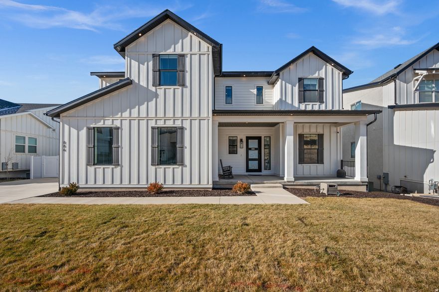 Built in 2022 and thoughtfully enhanced, 866 Winter Lane offers 6,215 sq ft, 4 bedrooms, 4.5 bathrooms, and over $250,000 in upgrades since purchased in June 2024. The main living space features 12-foot tray ceilings, custom built-ins, a striking stone fireplace, upgraded lighting, and large windows capturing expansive valley and mountain views. The kitchen is designed to gather, with top-of-the-line appliances and an extra-large island seating up to eight. The primary suite provides a calm retreat with a marble rain-shower bath, abundant natural light, and an oversized walk-in closet with space for a secondary washer and dryer. The 2,400+ sq ft daylight walkout basement truly sets this home apart, featuring a dedicated home gym, spa-quality steam shower and sauna, and a fully vented cigar room, along with generous space for entertaining and recreation. Situated on 0.33 acres with a recently finished backyard and fence installed, in a desirable North Salt Lake hillside location, this home blends modern construction, privacy, views, and lifestyle-driven upgrades.