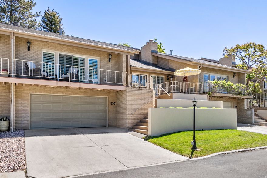 Exquisitely remodeled townhouse located in the prestigious North Pointe gated community, perched high in the Avenues above Salt Lake City. Showcasing high-end finishes throughout, this residence has been thoughtfully redesigned with elevated materials, including solid surface countertops, new flooring, a designer kitchen with LG appliances, and a Maytag washer and dryer included. The expansive main level features soaring vaulted ceilings and a light-filled, open-concept layout that seamlessly blends comfort and sophistication. The primary suite offers a spa-inspired bathroom with an oversized walk-in shower, while the lower level includes a versatile den with the potential to convert into an additional bedroom. An exceptionally large storage room with direct garage access provides ample space for outdoor gear and recreational equipment. Designed for both relaxation and entertaining, the home offers multiple outdoor living spaces, including private front and rear patios and a spacious deck capturing breathtaking, unobstructed views of the Salt Lake Valley, Great Salt Lake, Oquirrh Mountains, and the Wasatch Front-paired with unforgettable sunset vistas. Enjoy immediate access to the City Creek trail just steps from your door, along with a truly maintenance-free lifestyle. Residents of North Pointe enjoy exclusive amenities including a resort-style pool, clubhouse, tennis courts, and beautifully maintained grounds-all within a secure, private setting. Ideally located just minutes from downtown Salt Lake City, the University of Utah, and the airport, this is elevated living in one of the city's most coveted communities.