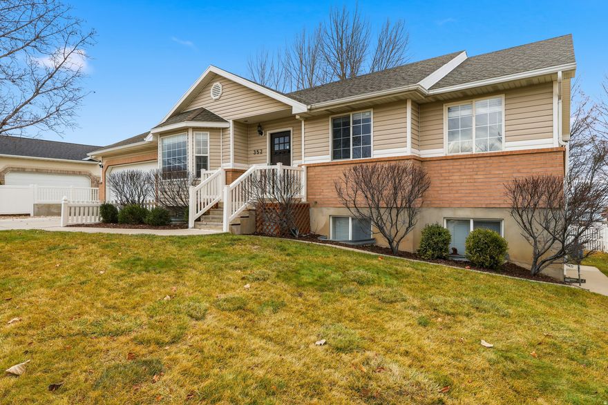**Open House Saturday, January 24th between 11 am & 1 pm** Exceptional rambler for families and investors alike! Ideally located down a dead-end street in northeast Lehi, just around the corner from the amazing 85-acre Lehi Family Park. 3 bedrooms, 1 & 3/4 baths on the main floor, including primary bedroom with walk-in shower. Basement is a 2 bd 1 bath apartment with separate walkout basement entrance, full kitchen, and its own laundry and office, perfect for guests or rental income. Beautiful views of the mountains and Utah Lake from the huge deck.  Good-sized fully-fenced back yard with firepit.  This one's a find for sure!