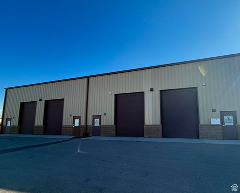 Photo of 2187 W PRINTERS ROW S #106/7, West Valley City, UT 84119 (MLS # 2115850)