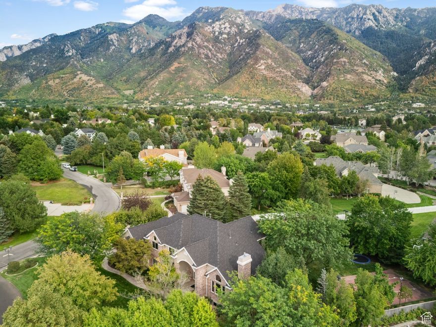 *Multiple Offers received*Welcome to this stunning one owner home located in the exclusive, 24-hour guard-gated,466 acre, Pepperwood community in Sandy, Utah! This   .63-acre lot offers a perfect blend of luxury, comfort, and functionality. Designed for modern living, the home features an open-concept floor plan, soaring ceilings, and abundant natural light throughout.  The gourmet chef's kitchen boasts high-end appliances, custom cabinetry, and a large island perfect for entertaining. Spacious living areas flow seamlessly to formal and casual dining spaces, while a private office or study provides a quiet retreat for work or reading. The master suite is a true sanctuary, with a large private covered deck to soak in the scenic mountain views, spa-like bathroom, dual vanities, and a walk-in closet. Additional bedrooms are generously sized, perfect for family or guests.The daylight lower level has a  Full second kitchen with separate walkout entrance to the garage,2 family rooms and 2 unfinished potential bedrooms with room to add another bathroom.  Step outside to your private  flat backyard oasis with plenty of space for outdoor living, gardening, recreation, a sport court and in ground trampoline.The property is part of the Pepperwood HOA with a modest monthly fee of $204, ensuring a well-maintained and welcoming community.  Location is exceptional-just minutes to World Class Snowbird and Alta Ski Resorts, Hiking & Biking Trails,Salt Lake City International Airport,  and a variety of shopping, dining, and entertainment options. This home combines luxury, convenience, and lifestyle, making it ideal for families, professionals, or anyone who loves to entertain. Don't miss your chance to own one of Sandy's most sought-after properties! Buyer to verify all information.