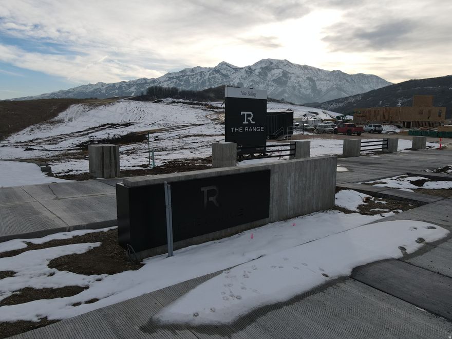 Buy a Lot, Bring a Builder, or Build with Us. Lot 122 at The Range in Mountain Green is a 0.50-acre estate lot, offering one of the most affordable ways to own in this luxury mountain community. Surrounded by the Wasatch Range and located just minutes from Snowbasin Resort and Pineview Reservoir, this homesite blends mountain seclusion with easy access to year-round recreation and a quick commute to Salt Lake City. Work with Cole West's design team to select from four professionally curated home plans, design a fully custom residence, or bring your own builder to create a home that reflects your lifestyle. With utilities stubbed to the lot and HOA care for open space landscaping, and snow removal, building here is as seamless as it is inspiring.