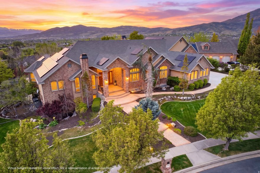 Luxury alpine living at its finest! If you have been searching for a property tailored to a distinctive lifestyle, this is it. Perched atop High Ridge Drive, this extraordinary one-acre estate offers a rare combination of comfort, recreation, and breathtaking views. Begin with the impressive 2,500-square-foot climate-controlled garage, then step into the 600-square-foot bonus room, an ideal space to relax, entertain, or create your perfect retreat. Inside the main residence, the thoughtful layout offers both elegance and flexibility. The main-level primary suite provides a private escape, while the heart of the home is a beautifully appointed kitchen featuring a Wolf range and double ovens, Bosch dishwasher, KitchenAid compactor, and a generous pantry complete with an additional refrigerator and freezer. When it is time to work or unwind, the options are endless. Enjoy the warmth of the fireplace in the den, gather with guests in the sitting area, or open the full glass doors to the covered patio and take in the sweeping valley views. Evenings here are unforgettable, with spectacular sunsets and the glow of the outdoor fireplace creating the perfect setting. No need to worry about energy with solar power helping offset costs. The lower level is designed for lifestyle and leisure, featuring a second kitchen, theater room, and a dedicated fitness room ready for your equipment of choice. The wellness amenities are exceptional, including an infrared sauna by Sunlighten, full steam shower, and Renu cold plunge bath for the ultimate self-care experience. Outdoors, summer living truly shines with another full glass tri-fold door. Lounge poolside, soak in the sunshine, and enjoy the kind of setting that turns everyday life into a retreat. However you define living the dream, this remarkable estate is ready to make it a reality!