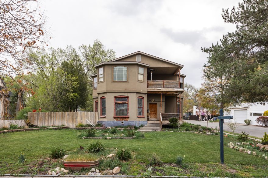 Developers and investors, take note...opportunities like this don't come along often, and when they do, they don't last. This centrally located Salt Lake City lot sits just minutes from freeway access, TRAX, and some of our city's best shopping and dining, making it both practical and promising. The numbers bear some real importance here: 13,500 square feet (197 x 66) of subdividable land on a rare .3-acre corner lot in a market where density is increasingly in demand. Per zoning change approval with the city, the development potential reaches up to 18 units, and we think that's a figure worth considering. The lot is available in full, or .15 acres can be purchased separately, offering flexibility for a range of development approaches and investment levels. What exists now is a 1920 Victorian with genuine character-exposed brick, ornate crown moldings, transom details, 12-foot ceilings, six-foot windows, and an upper balcony with uninterrupted views of Mt. Olympus and the Oquirrhs-and a mother-in-law apartment that adds utility. The home is what it is: a piece of history on a piece of land that's undoubtedly ready for a new chapter. Our city is actively embracing density and development, and a central and subdividable lot like this is exactly what you should be looking for.    Square footage figures are provided as a courtesy estimate only.  Buyer is advised to obtain an independent measurement.