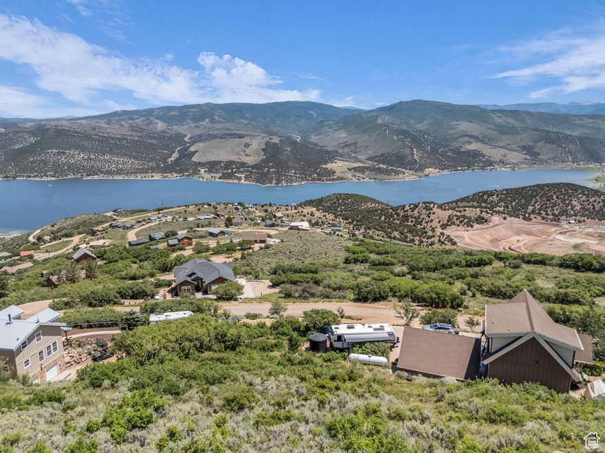 This is your chance to own one of the most desirable lots in Lake Rockport Estates - complete with a RARE, installed water meter (a major bonus in this area!). Set on a full acre, this property boasts absolutely STUNNING, unobstructed views of Lake Rockport and the surrounding mountains. A professional survey is already completed, and cabin plans are available from the seller, helping you take the next step toward creating your ideal mountain escape. Enjoy year-round access and easy proximity to boating, fishing, hiking, skiing, and more - all just 20 minutes from Park City and under an hour from Salt Lake City. Whether you're planning a weekend cabin or a full-time mountain home, this property offers unmatched views, privacy, and convenience. Opportunities like this don't come around often!