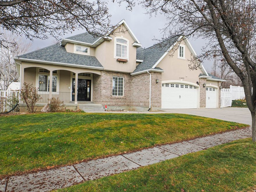 STUNNING SOUTH JORDAN RETREAT | NEW PAINT & CARPET | CORNER LOT Located in the heart of South Jordan, this elegant residence has been beautifully refreshed with brand-new carpet and professional paint, creating an interior that is remarkably open, bright, and move-in ready. Situated on a premier corner lot, this home offers the perfect blend of luxury and functionality with 6 spacious bedrooms and 3.5 bathrooms. The main level showcases refined living spaces anchored by two cozy fireplaces. Retreat to the expansive primary suite, featuring a private balcony and a unique "hidden" bonus room accessed through the closet-perfect for a nursery, executive office, or private lounge. The fully finished basement is an entertainer's dream, complete with a second kitchen and a dedicated kids' playroom, making it ideal for multi-generational living or guests. The outdoor amenities are unparalleled: Recreation: Private basketball court, charming fire pit area, and built-in swing set. Hobbies: Thriving vegetable garden and 3 storage sheds. Parking: Extra-long 3rd-car garage plus dedicated RV parking for all your toys. This exceptional property combines space, elegance, and thoughtful amenities in an unbeatable location. Schedule your tour today!