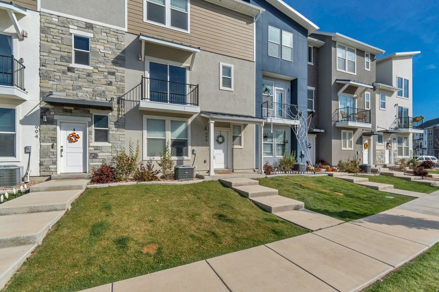 ***OPEN HOUSE TODAY FROM 4-6PM***.  COME AND GET SOME DONUTS!!!  This stunning townhome offers 4 spacious bedrooms and 3 full bathrooms in a highly sought-after location - just steps away from a park and the community pool.   The main level features a welcoming family room or office space and convenient access to the attached garage.   Upstairs, the second level showcases an open-concept layout with a beautifully upgraded kitchen, dining area, family room, full bath, and a versatile bedroom that can serve as an office or guest suite.   On the top floor, you'll find the primary suite, two additional bedrooms, and a conveniently located laundry area.   Enjoy hard flooring in all high-traffic areas, stainless steel appliances, and an extra-long two-car garage for added storage. Don't miss this rare opportunity - this is one of the only four-bedroom townhomes available in the area!