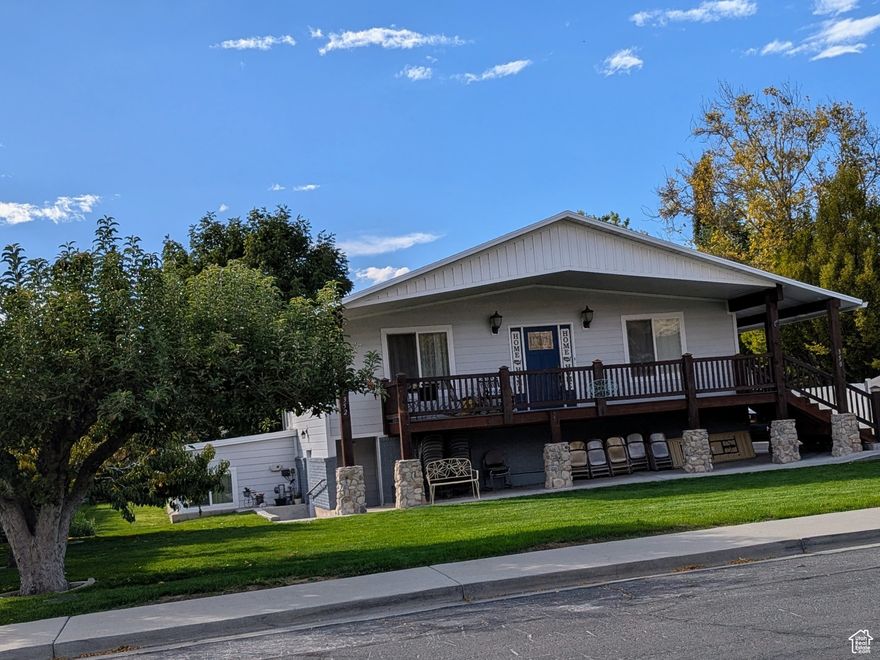 A wonderfully clean, updated & remodeled, open style home with over 4500sq ft., 7 bedrooms, 3 baths, 2 large full kitchens & private entrances.  Also included is a large , over 2,000 sq. ft. accessory (mother-in-law) apt. ... which has a large kitchen, 3 bedrooms, large living room & dinning area.  All windows are double pane prime vinyl.  All plumbing, & electrical systems have been redone & updated before 2016. The entire home runs on solar with a backup battery. (meaning no electrical charges & no down time due to storms etc. About a $50,000+ upgrade. ) There are 3 furnaces with 'soft start', 2 attic fans, 2 basement entrances, 2 microwaves, 2 ranges, & 2 washers & dryers.  One fridge stays ( the apt. one ) with the house.  The upstairs has A/C which runs off the solar.  The accessory apt is plumed for a/c, to be added, but has remained cool & comfortable throughout the summers for its occupants.  There is a massive amount of storage area with an open family friendly flow through the main home & the roomy mother-in-law apt.  The down stairs apt has no stairs, wheelchair friendly with a roll-in shower.  Buyers and Buyers rep to verify all information.  Pricing & sq. footage are based an recent appraisal.