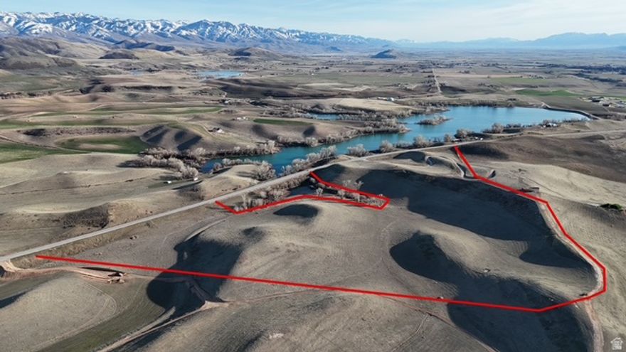 Seize the rare opportunity to own over 50 acres of Southeast Idaho paradise, strategically located directly across form  Foster Reservoir.  Offering unbeatable  lake view, sweeping mountain vistas, and open valley scenery  captures 360 panoramic views.  This treasure stands out as a true Idaho outdoor haven.  Whether you're an avid angle, boating,  hunting, trail rider, ventures mountain biking, ATV/UTV , snowmobiling and cross-county, or  simply seeking peaceful mountain-valley-lake living, this is your chance to claim a piece of Idaho. Electrical conduit has been put in.