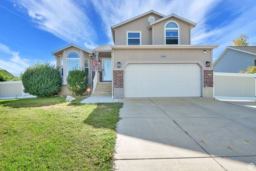 This spacious 4-bedroom home is packed with upgrades and thoughtful details. Completed basement provides extra living space, while vaulted ceilings create an open, airy feel. Step outside to a large Trex deck, concrete patio, and built-in gas BBQ connection-perfect for entertaining. Inside, you'll love the knotty maple cabinets, stylish two-tone paint, and warm finishes throughout. A generous RV pad and backyard shed add practicality, and the west-facing driveway makes snow removal simple. A perfect blend of comfort, style, and convenience awaits.