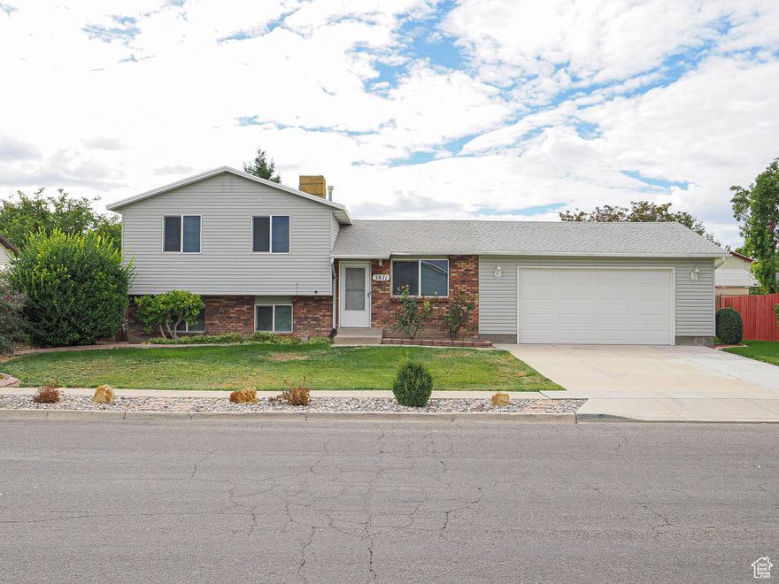 Home is bigger than it looks with huge back yard, Nicely updated home for you; newer cabinets and counter tops with new flooring, brand new carpeting and paint throughout, brand-new laundry and 1/2 bath down stairs, some new lighting, newer water heater, sanded area for future playground, cemented crawl space for extra storage, come see and enjoy this gigantic painted garage (24 ' x 26')  and back yard with a nice patio for entertaining...This home is turn-key move in ready, just hang your pictures and move in. Easy to show.