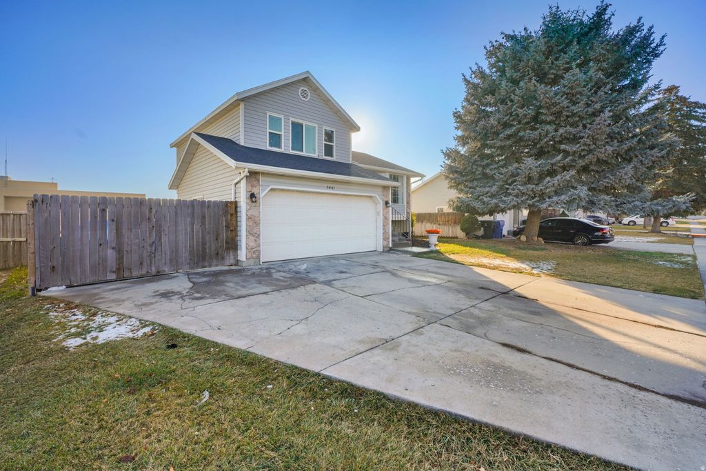 Photo of 5661 W SUNKIST DR S, Kearns, UT 84118 (MLS # 2131243)