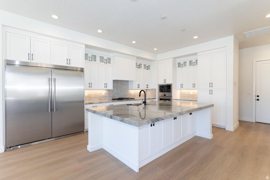 Boasting 8 bedrooms and 8 bathrooms within 4,105 square feet, the Santa Barbara II is perfect for large families or groups seeking an unforgettable stay in Desert Color. The home features a gourmet kitchen, built-in mini bar, and expansive rec rooms designed for fun and relaxation. Bunk rooms accommodate larger groups, making it ideal for family vacations or group getaways. LVP flooring flows throughout the home, with tiled showers in every bathroom adding to the luxury. The second-floor deck, complete with a hot tub and fire table, provides a perfect spot for unwinding. Step into the Desert Color lifestyle with resort-style amenities at your fingertips.