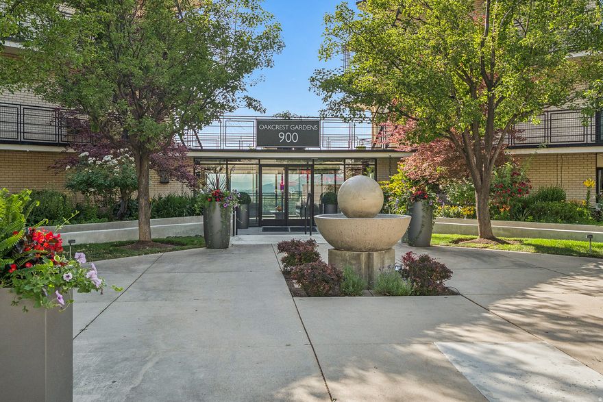 Located in the coveted mid-century designed Oakcrest Gardens Condominiums, this refined single level residence blends luxury, comfort, and panoramic views. Perched on the sixth floor, it showcases sweeping vistas of the Salt Lake Valley and downtown city lights from a dramatic 180degree wraparound terrace. Professionally renovated with a designer's eye, the home features hardwood floors, ninefoot ceilings, custom LED lighting, and a striking gas fireplace with a granite mantel that together create an atmosphere of warmth and sophistication. The expansive primary suite offers a serene retreat with a private seating area and two spacious walkin closets with custom builtns. A wellappointed secondary bedroom includes its own generous walkin closet, dual vanity, Euroglass shower, and separate soaking tub-ideal for guests or extended stays. The gourmet kitchen is both beautiful and highly functional, with abundant custom cabinetry, fullheight backsplash, bar seating, and sleek highend appliances. Additional conveniences include a dedicated laundry and office space with custom bookcases and cabinetry. Designed for memorable gatherings, the formal dining room flows effortlessly into an inviting family room with builtin cabinets and bookcases. Ideally situated at the mouth of Emigration Canyon, the home offers quick access to shopping, dining, hiking and biking trails, the University of Utah, and downtown Salt Lake City. Two reserved garage parking spaces and elevator access complete this rare eastbench offering defined by professional design and unforgettable views.