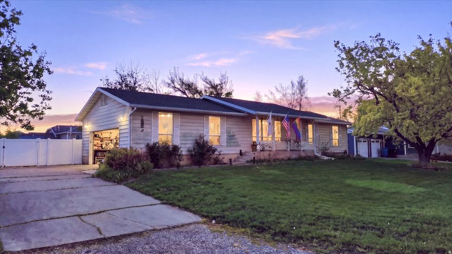 A Home with Golf Course and Mountain Views!! Make time to come see this 5 Bed/3 Bath Logan rambler-style home on a spacious .39 acre lot. Two family rooms, storage galore, new furnace and heat pump, updated downstairs flooring, updated paint throughout, outdoor gazebo entertainment area, outdoor shed, fruit trees and more!