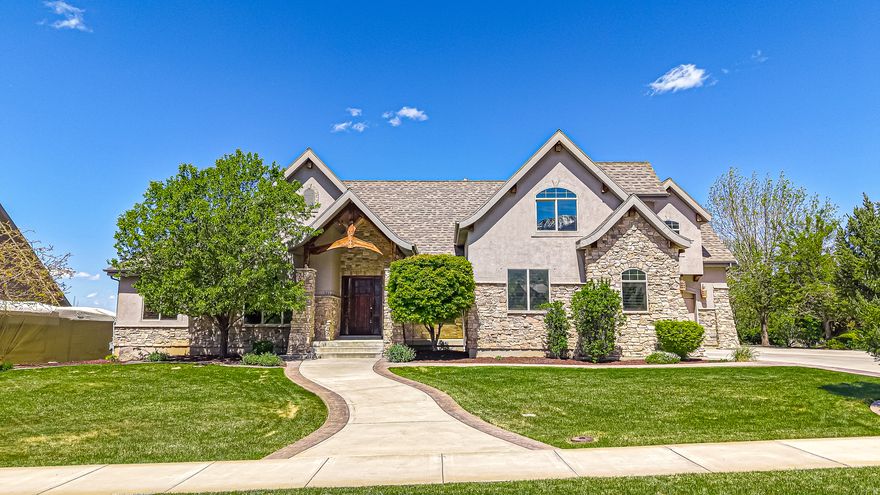 Be sure to check out the 3D tour. Located in one of Salem's most desirable neighborhoods, this original-owner home offers incredible views of the mountains, valley, and lake along with beautifully landscaped grounds and exceptional curb appeal. Inside, you'll find vaulted ceilings, hardwood flooring, plantation shutters, recessed lighting, and a cozy gas fireplace that create a warm yet refined atmosphere. The kitchen is thoughtfully designed with a separate gas cooktop, double ovens, and quality finishes, while the nearby laundry room includes cabinetry and a sink for added convenience. The spacious master suite features a walk-in closet, separate tub and shower, and a well-appointed layout for comfort and privacy. Additional highlights include a main-level office just off the entry, stain-grade custom doors, upgraded railings, central vacuum, and a walkout daylight basement with cold storage. Built with efficiency and durability in mind, the home includes 2x6 exterior walls, blown-in upgraded insulation, two HVAC systems, and two water heaters. Enjoy outdoor living on the covered deck and patio, and take advantage of the oversized garage for ample parking and storage.